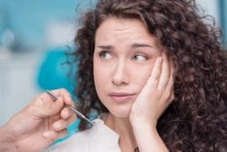 Woman suffering from toothache